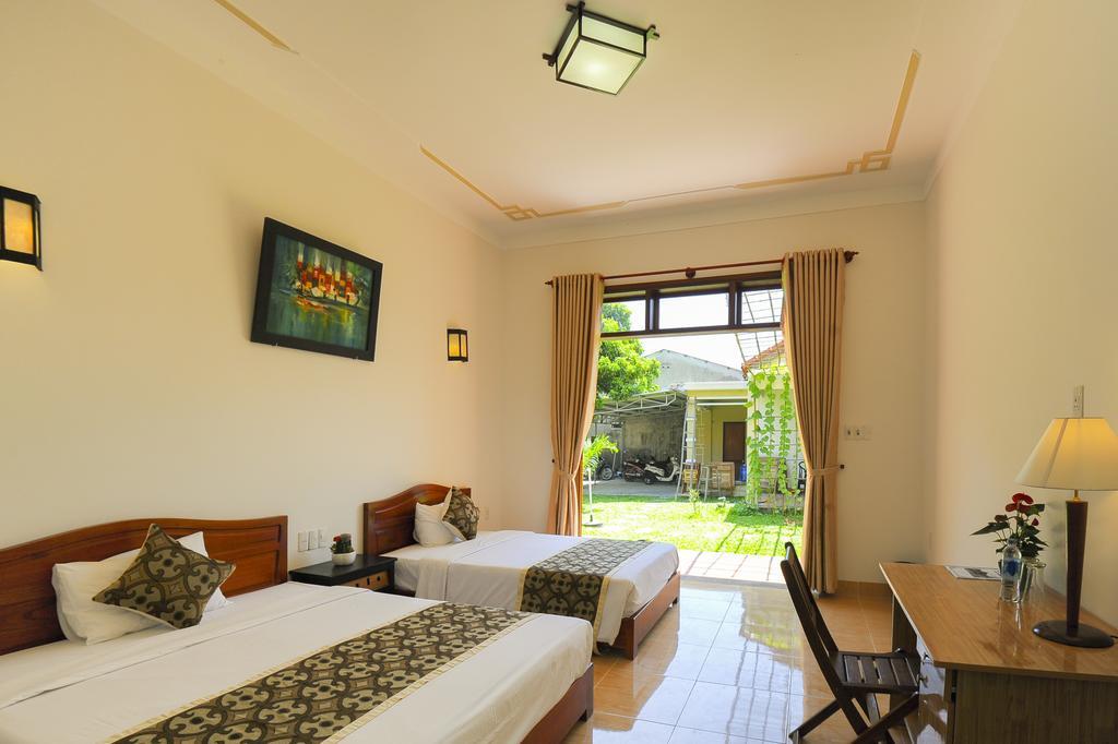 Galaxy Homestay Хойан Номер фото