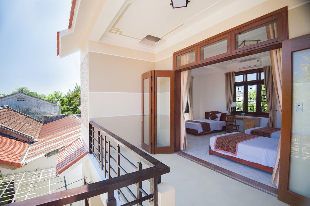 Galaxy Homestay Хойан Номер фото